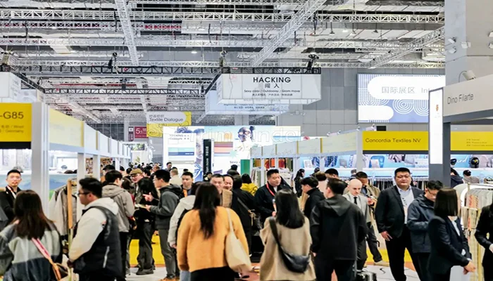 Visitors and exhibitors networking at Intertextile Shanghai 2025 Autumn Winter Exhibition