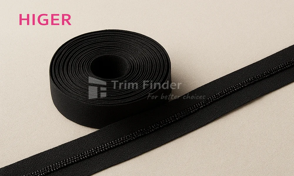 Roll of black continuous zipper tape used for custom-length zipper projects, with HIGER branding.